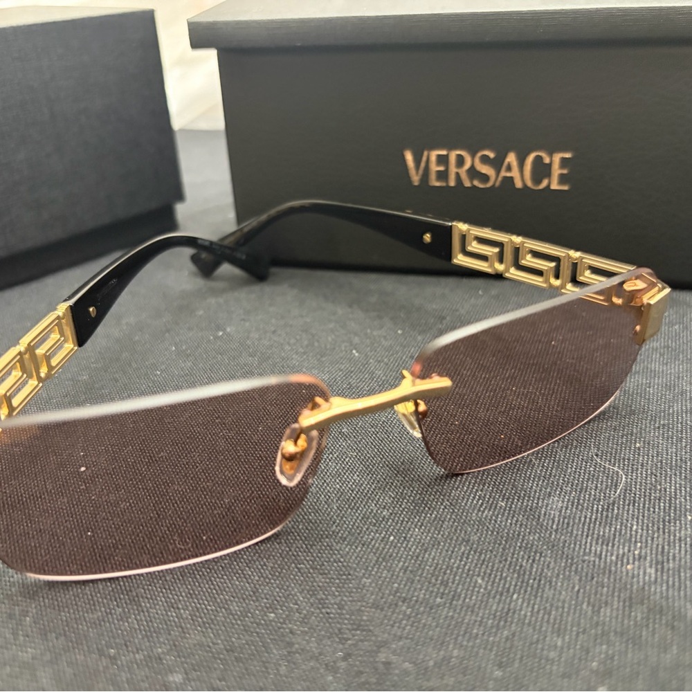 Versace Gold and Black Rimless Sunglasses